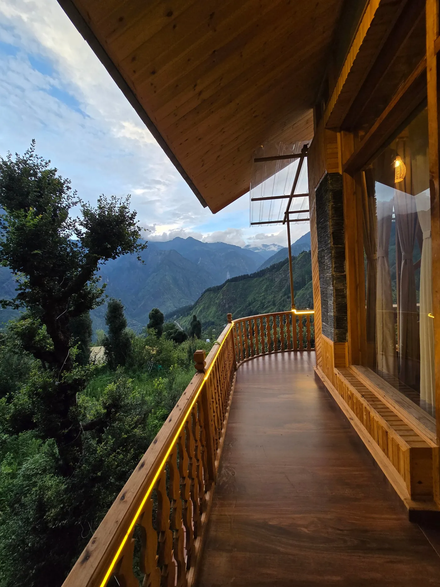 Balcony at dusk with a glowing handrail